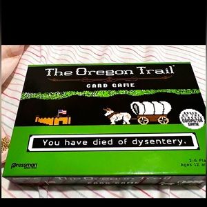 Oregon Trail Card Game - never opened(photo shows the tape still stuck to box)